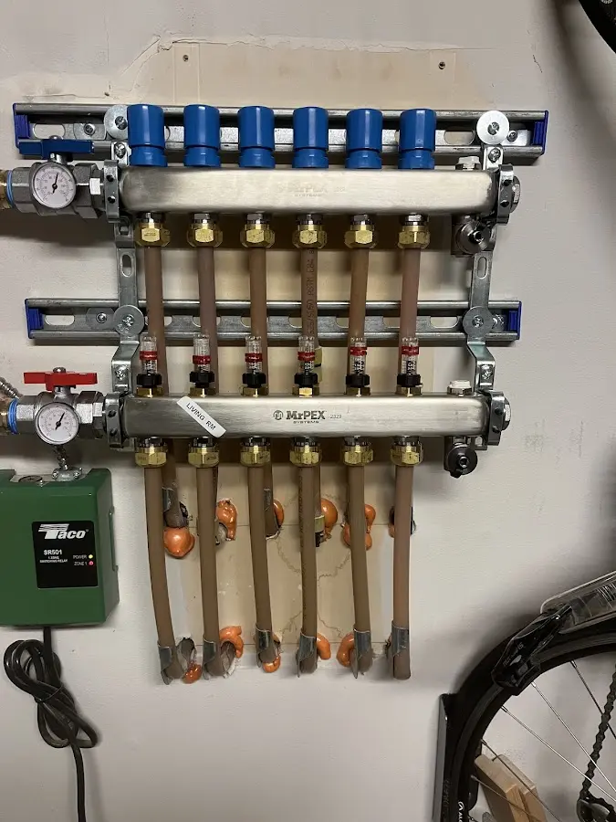 Plumber performing Water Heater Repair at a residential property in Niwot